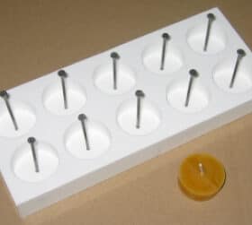 Silikongießform Teelicht glatt 10-fach